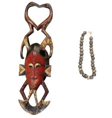 Lot 386 - A carved wooden African Guro mask from the...