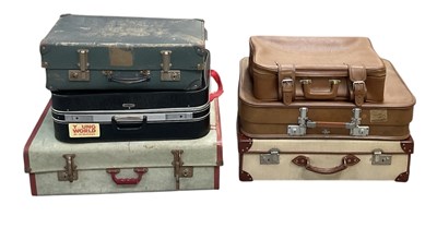 Lot 254 - A collection of six vintage suitcases by...