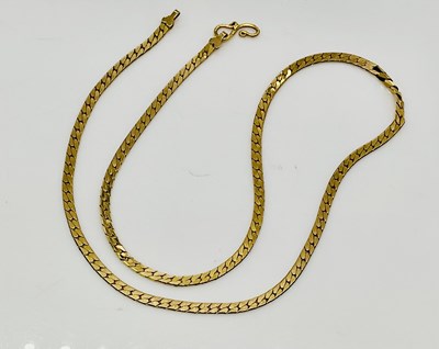 Lot 847 - A yellow metal flat link chain, stamped '916',...
