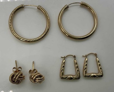 Lot 849 - Three pairs of 9ct gold earrings, combined...