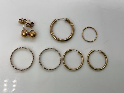 Lot 857 - A collection of 9ct gold earrings (one pair...