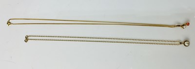 Lot 860 - Two 9ct gold chains with pearl pendants,...