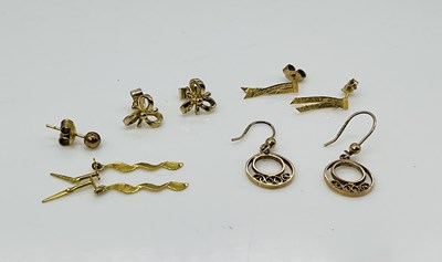 Lot 863 - A group of 9ct gold and yellow metal earrings,...
