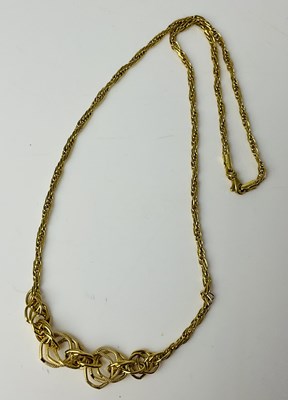Lot 867 - A yellow metal rope twist necklace, stamped...