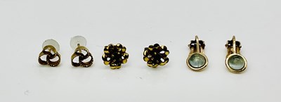 Lot 879 - Three pairs of 9ct gold ear studs and clips,...