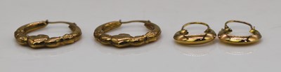 Lot 881 - Two pairs of 9ct gold earrings, combined...