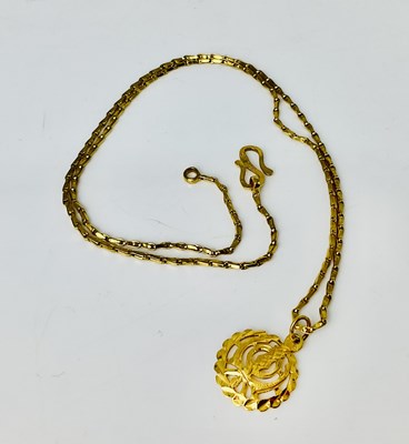 Lot 898 - A 22ct gold pendant on chain, stamped '916,...