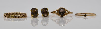 Lot 920 - Two 9ct gold rings, a yellow metal ring and a...