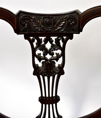 Lot 8 - An Edwardian inlaid walnut low elbow chair...