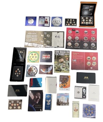 Lot 615 - A collection of commemorative coin sets, year...