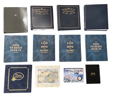 Lot 627 - Two albums of royal commemorative coin covers...