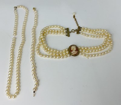 Lot 938 - A three strand pearl choker, with 9ct gold...