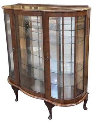 Lot 47 - A 1930s Art Deco walnut veneered serpentine...