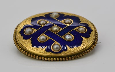 Lot 943 - A Victorian yellow metal, blue enamel and...