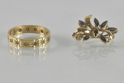 Lot 500 - A 9ct yellow gold paste set full eternity...