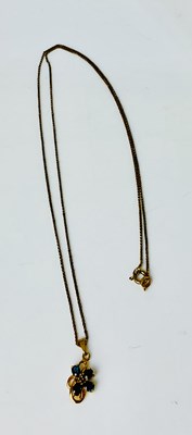 Lot 945 - A 9ct gold chain, length 60cm, with yellow...