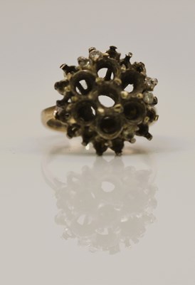 Lot 947 - An 18ct gold ring mount with floral setting,...
