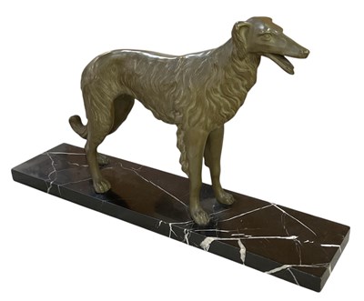 Lot 375 - A 1930s Art Deco patinated bronze figure of a...