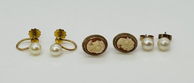 Lot 951 - Three pairs of 9ct gold ear studs, one screw...