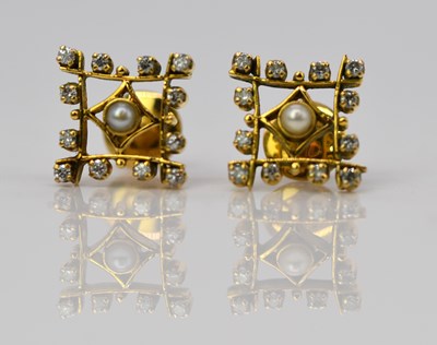 Lot 955 - A pair of yellow metal diamond and pearl ear...