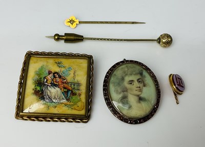Lot 956 - Three yellow metal stickpins (one af) and two...