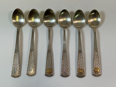 Lot 505 - A set of six white metal and yellow metal...