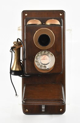 Lot 313 - A vintage wall mounted telephone, 45cm.