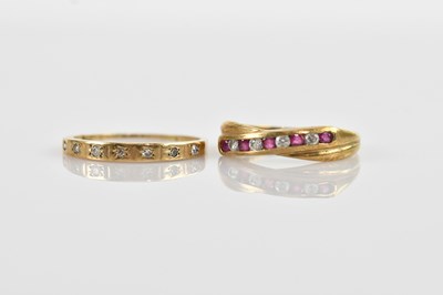 Lot 551 - Two 9ct yellow gold dress rings set with clear...