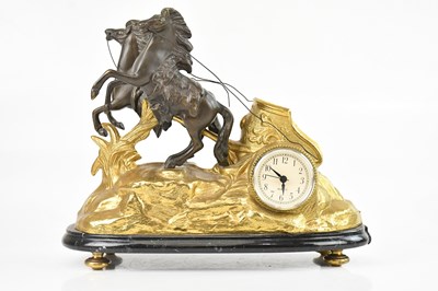 Lot 270 - A reproduction Italian figural mantel clock...