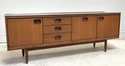 Lot 4 - WILLIAM LAWRENCE; a mid century teak sideboard,...