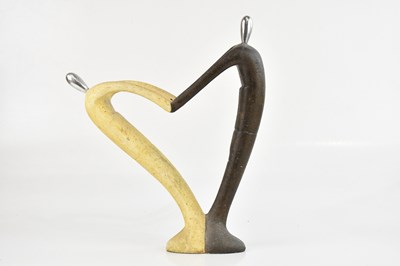 Lot 1660 - HERMESE; a resin sculpture of two figures in...