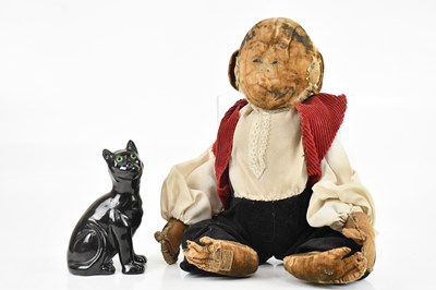 Lot 637 - MERRYTHOUGHT; a stuffed monkey toy, length...