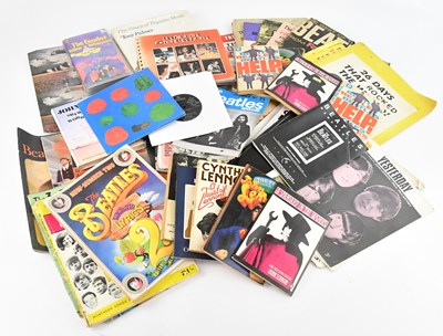 Lot 295 - THE BEATLES; a collection of Beatles...