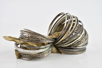 Lot 591 - A collection of 800 and 835 grade bangles and...
