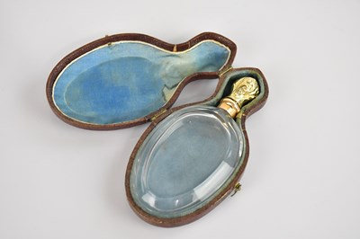 Lot 362 - A Victorian clear glass perfume bottle, with...