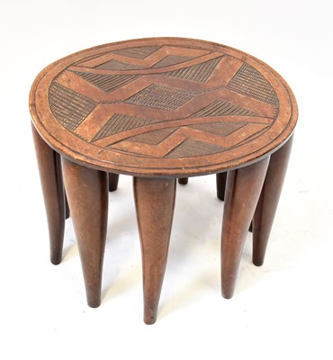 Lot 205 - An African carved top stool/small table, with...