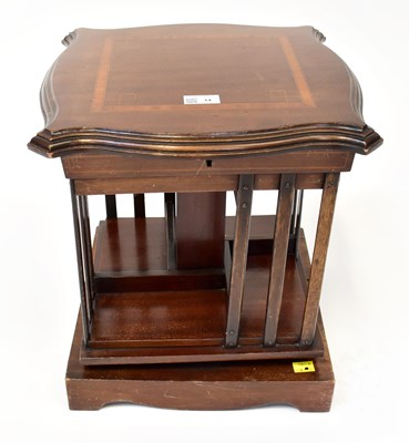 Lot 14 - An Edwardian mahogany tabletop revolving...