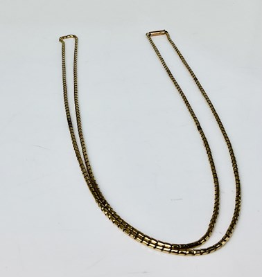 Lot 566 - A 9ct yellow gold long chain, length 89cm,...