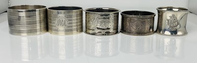 Lot 481 - Five hallmarked silver napkin rings, various...