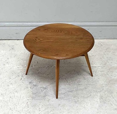 Lot 19 - IN THE MANNER OF ERCOL; a small elm drop-leaf...