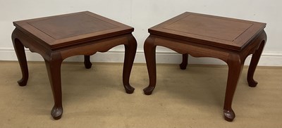 Lot 75 - A pair of Chinese wooden low coffee tables,...