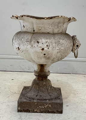 Lot 231 - A Victorian cast iron urn, with lion head loop...