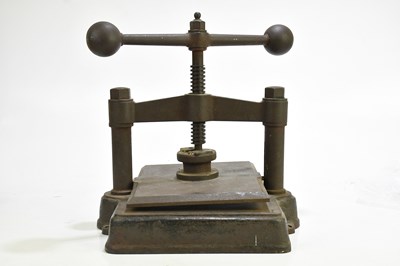 Lot 315 - A cast iron book press, width 35cm.