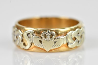 Lot 2436 - A yellow and white metal Claddagh ring,...