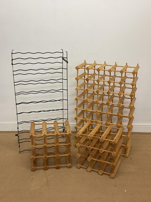 Lot 306 - Four wine racks of various sizes, three pine...