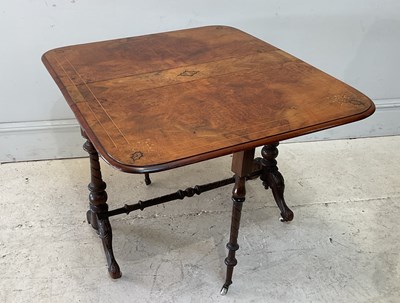 Lot 150 - A 19th century walnut inlaid drop-leaf table,...