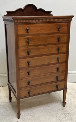 Lot 148 - An Edwardian seven drawer music cabinet, on...