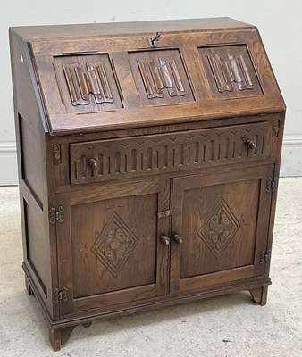 Lot 84 - A reproduction Priory style bureau, and a...