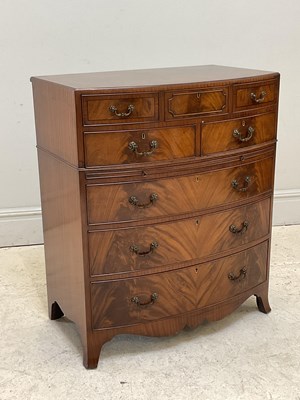 Lot 63 - A mid 20th century mahogany bowfront chest of...