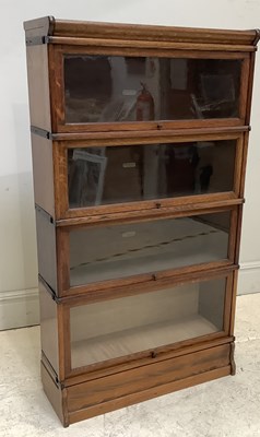 Lot 93 - THE GLOBE WERNICKE CO LIMITED; an oak metal...